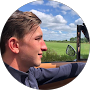 Man driving convertible car